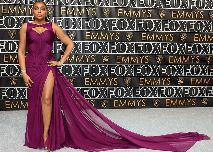 Taraji P. Henson dazzles in a light purple dress with a slit at the