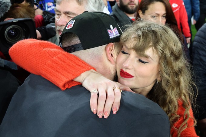 Taylor Swift Smiles in Travis Kelce’s Arms