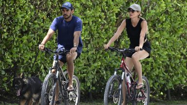  Joaquim Valente and Gisele Bündchen are seen on a bike ride on July 14, 2024 in Surfside, Florida. (Photo by MEGA/GC Images)