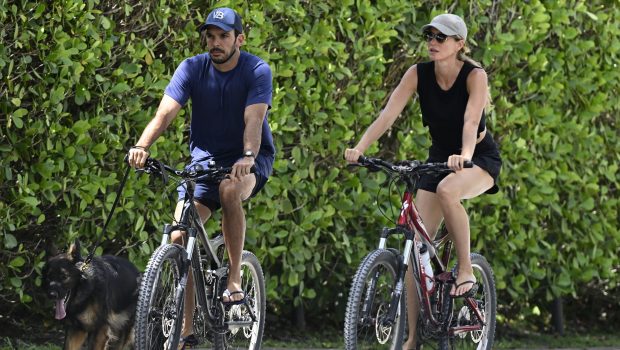 SURFSIDE, FL - JULY 14: Joaquim Valente and Gisele Bündchen are seen on a bike ride on July 14, 2024 in Surfside, Florida. (Photo by MEGA/GC Images)