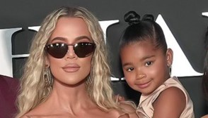 Khloe Kardashian holding daughter True