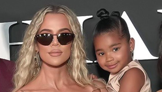 Khloe Kardashian holding daughter True