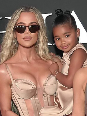 Khloe Kardashian holding daughter True