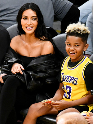 Kim Kardashian and son Saint at a Lakers game