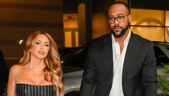 Larsa Pippen and Marcus Jordan holding hands