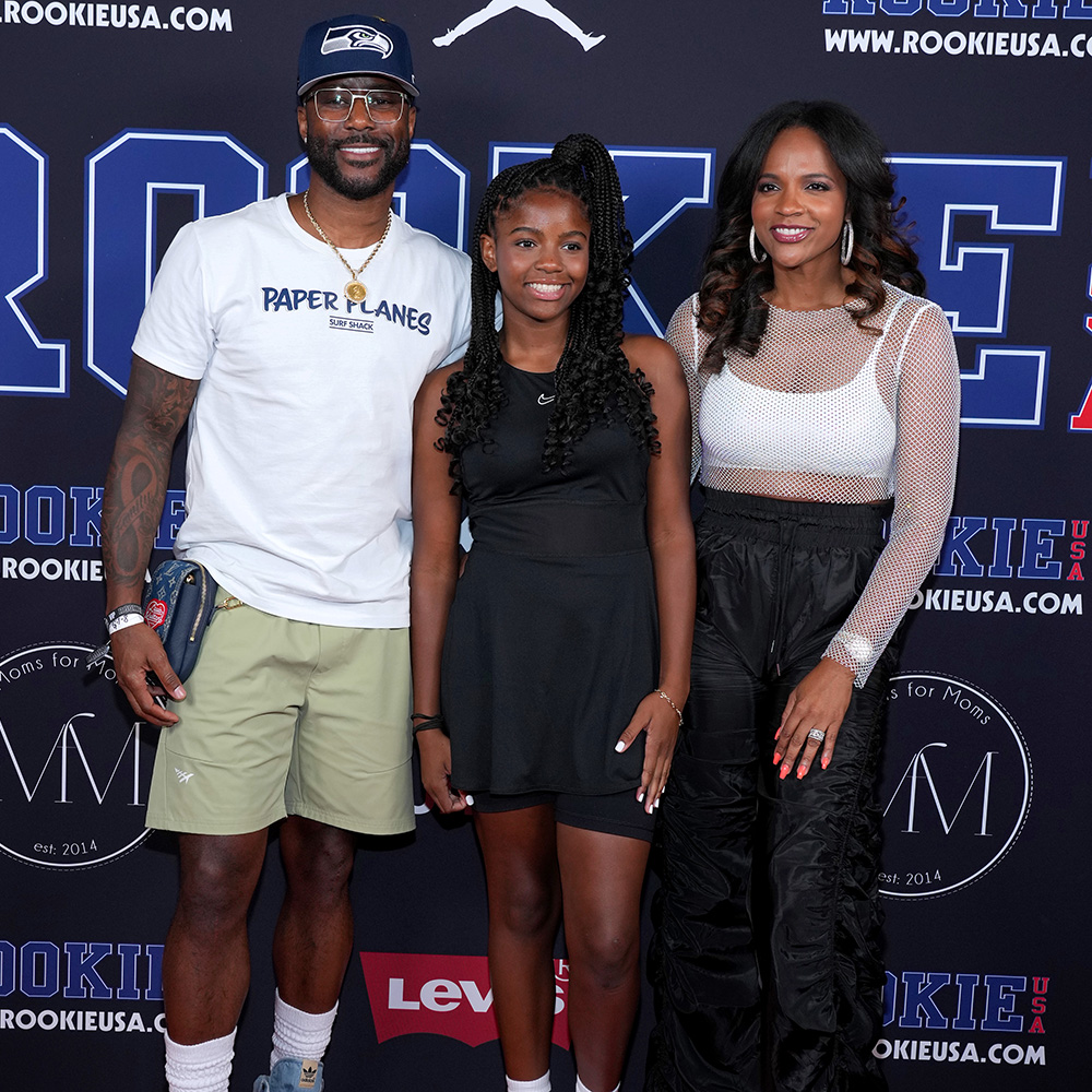 Nate Burleson, his daughter Mia and wife Atoya 