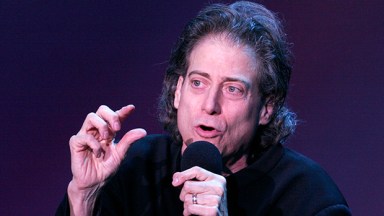 Richard Lewis performing stand-up