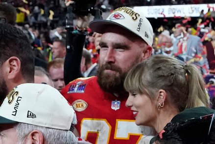 Kansas City Chiefs' tight end #87 Travis Kelce and US singer-songwriter Taylor Swift embrace as they celebrate the Chiefs winning Super Bowl LVIII against the San Francisco 49ers at Allegiant Stadium in Las Vegas, Nevada, February 11, 2024. (Photo by TIMOTHY A. CLARY / AFP) (Photo by TIMOTHY A. CLARY/AFP via Getty Images)