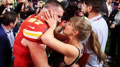 Travis Kelce and Taylor Swift kissing at the 2024 Super Bowl
