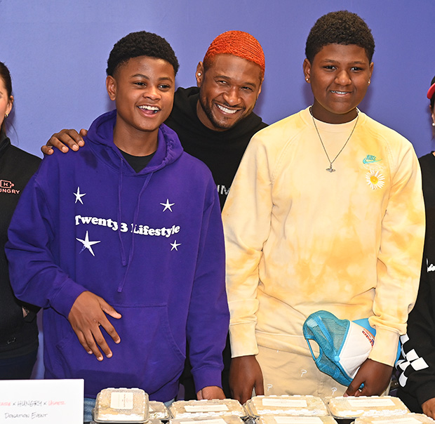 Usher with his sons
