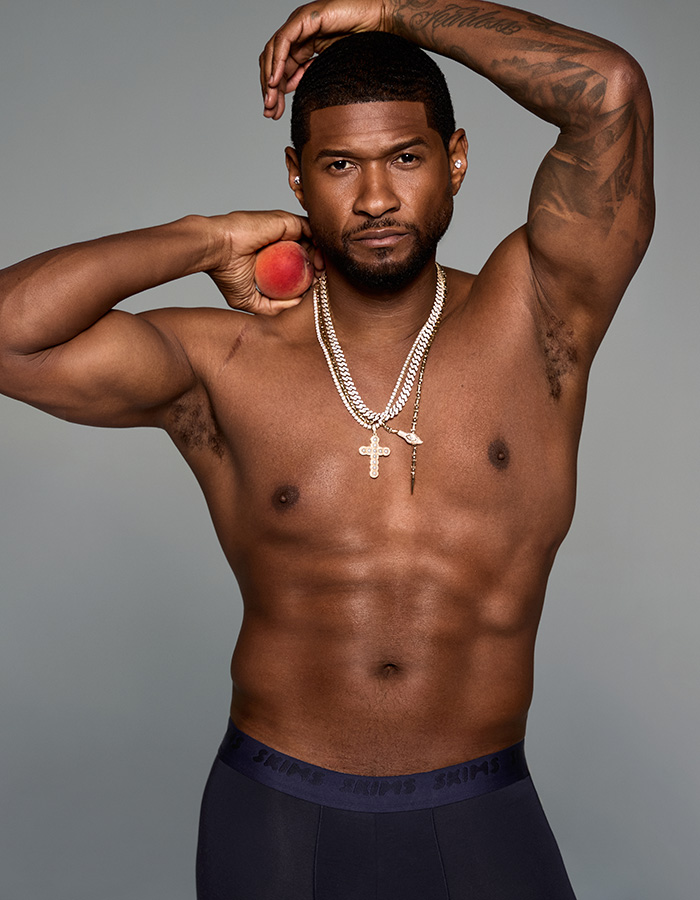 Usher posing for SKIMs Mens