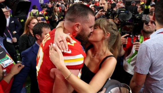 Taylor Swift and Travis Kelce kissing at the Super Bowl 2024