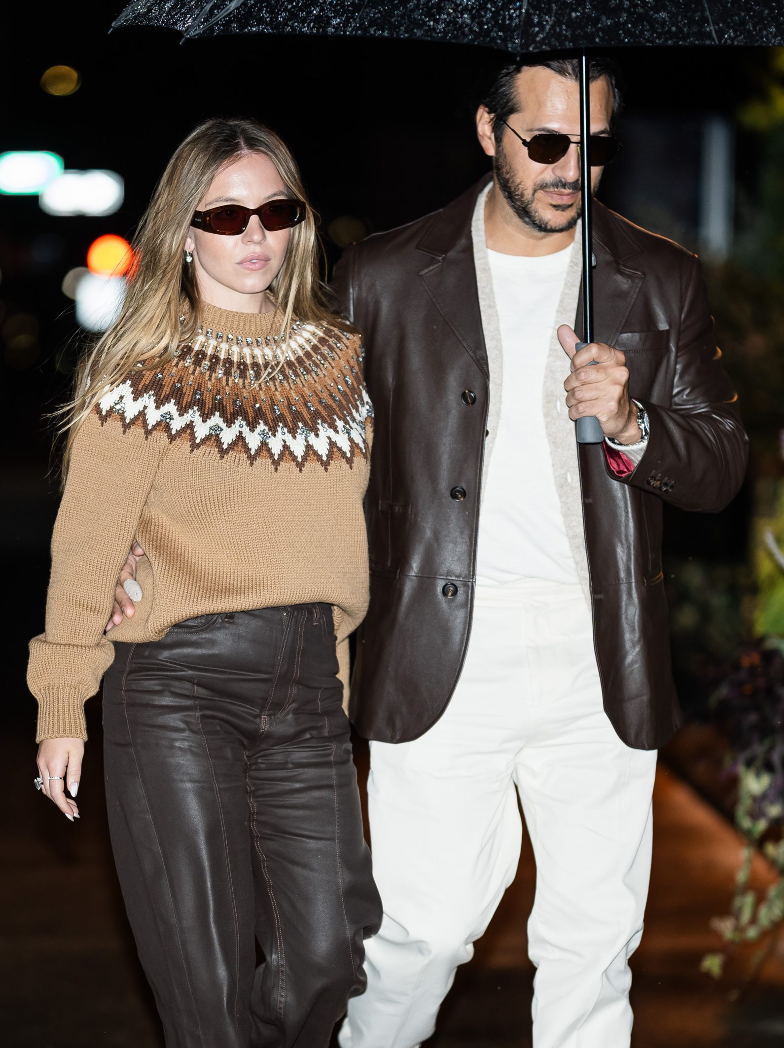 NEW YORK, NEW YORK - DECEMBER 15: Sydney Sweeney (L) and Jonathan Davino are seen in Chelsea on December 15, 2024 in New York City. (Photo by TheStewartofNY/GC Images)