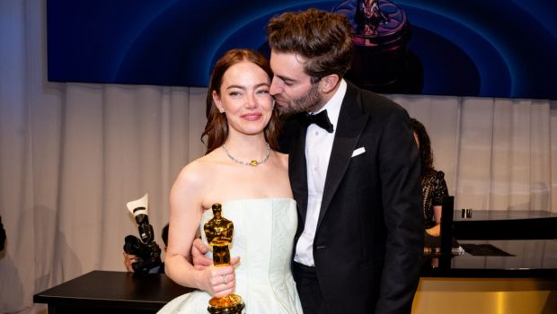 Emma Stone & Husband Dave McCary Seal Her Oscars Win With a Kiss in Rare PDA Photo