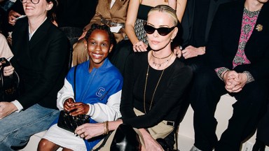 August Theron and Charlize Theron at a fashion show in New York