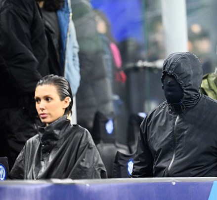 MILAN, ITALY - FEBRUARY 20: Bianca Censori and Kanye West are seen during the UEFA Champions League 2023/24 round of 16 first leg match between FC Internazionale and Atletico Madrid at Stadio Giuseppe Meazza on February 20, 2024 in Milan, Italy. (Photo by Mattia Ozbot - Inter/Inter via Getty Images)