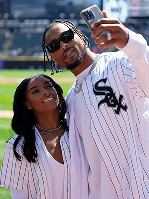 Simone Biles and Jonathan Owens at a baseball game