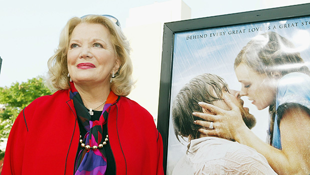 Gena Rowlands in front of a Notebook billboard