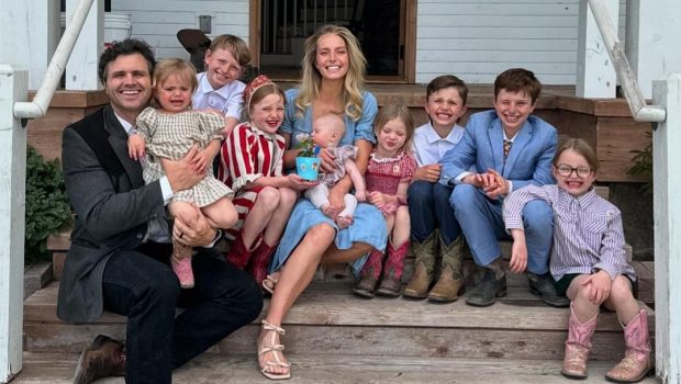 Hannah Neeleman and her family sitting on a porch