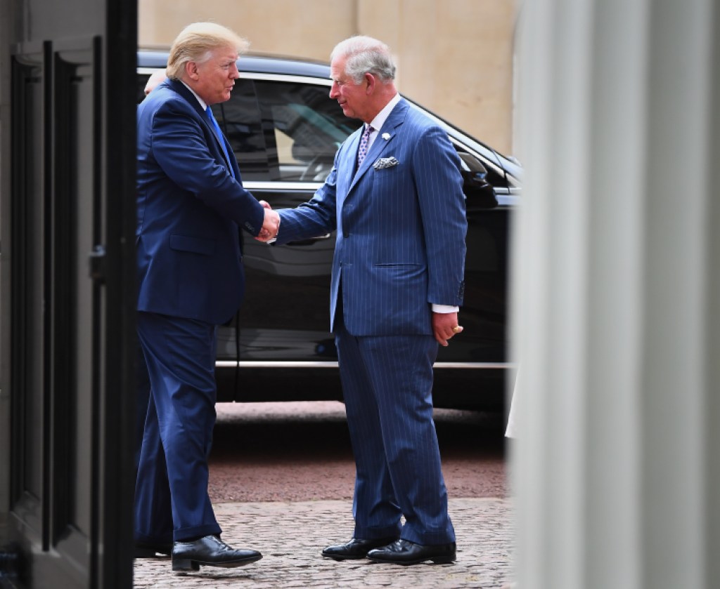 LONDON, ENGLAND - JUNE 03: U.S. President Donald Trump shakes hands with Prince Charles, Prince of Wales as he arrives for tea at Clarence House on June 3, 2019 in London, England. President Trump's three-day state visit will include lunch with the Queen, and a State Banquet at Buckingham Palace, as well as business meetings with the Prime Minister and the Duke of York, before travelling to Portsmouth to mark the 75th anniversary of the D-Day landings. (Photo by Victoria Jones - WPA Pool/Getty Images)