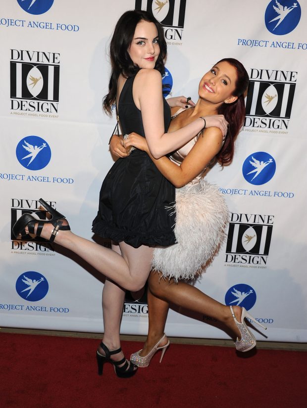   Actresses Liz Gillies and Ariana Grande arrive at Project Angel Food's 2011 Divine Design Gala at the Beverly Hilton on December 7, 2011 in Beverly Hills, California.  (Photo by Angela Weiss/Getty Images)