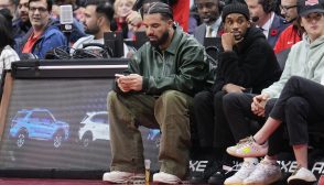 TORONTO, ON - NOVEMBER 6: Drake uses his phone as him and Future the Prince watch the game between the Toronto Raptors and the Chicago Bulls at the Scotiabank Arena on November 6, 2022 in Toronto, Ontario, Canada. NOTE TO USER: User expressly acknowledges and agrees that, by downloading and/or using this Photograph, user is consenting to the terms and conditions of the Getty Images License Agreement. (Photo by Mark Blinch/Getty Images)