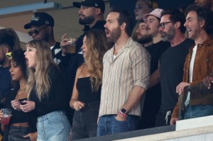 EAST RUTHERFORD, NEW JERSEY - OCTOBER 01: (L-R) Singer Taylor Swift, Actor Ryan Reynolds and Actor Hugh Jackman cheer prior to the game between the Kansas City Chiefs and the New York Jets at MetLife Stadium on October 01, 2023 in East Rutherford, New Jersey. (Photo by Elsa/Getty Images)