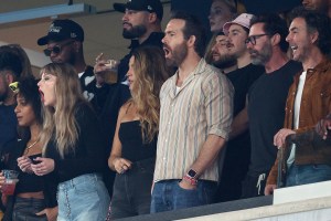  (L-R) Singer Taylor Swift, Actor Ryan Reynolds and Actor Hugh Jackman cheer prior to the game between the Kansas City Chiefs and the New York Jets at MetLife Stadium on October 01, 2023 in East Rutherford, New Jersey. (Photo by Elsa/Getty Images)