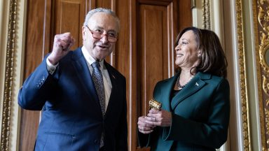 Chuck Schumer presents a golden gavel to Vice President Kamala Harris