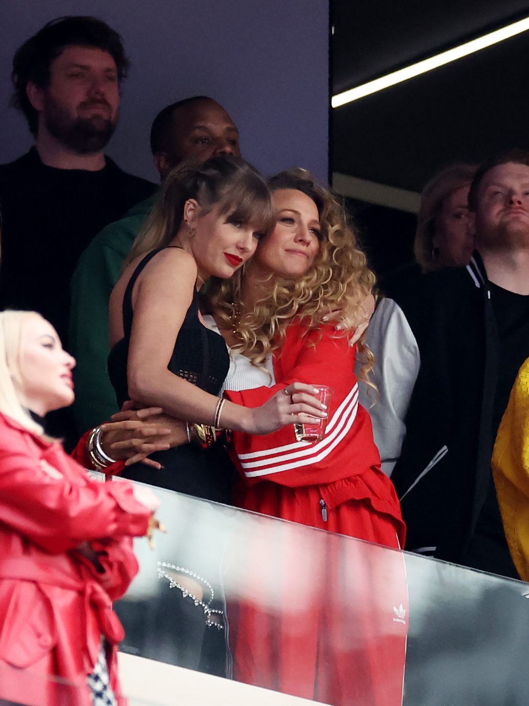 LAS VEGAS, NEVADA - FEBRUARY 11: Rapper Ice Spice, Singer Taylor Swift and Actress Blake Lively hug prior to Super Bowl LVIII between the San Francisco 49ers and Kansas City Chiefs at Allegiant Stadium on February 11, 2024 in Las Vegas, Nevada. (Photo by Ezra Shaw/Getty Images)