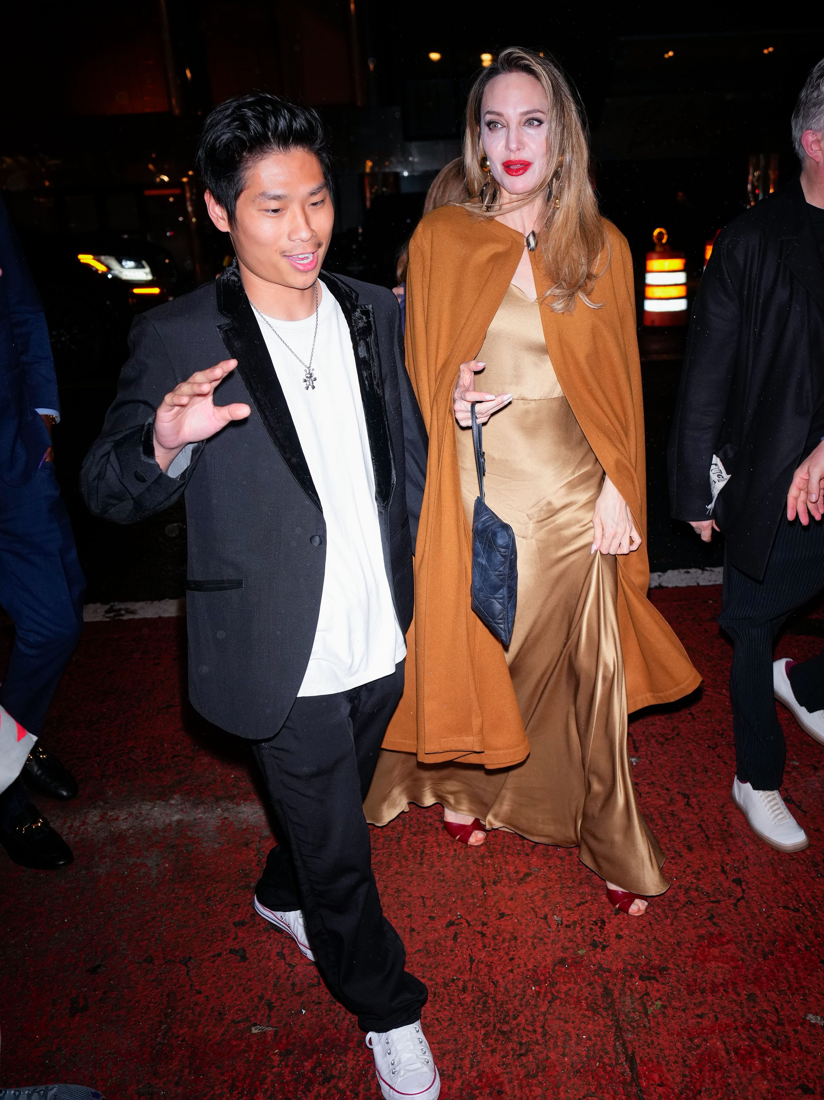 NEW YORK, NEW YORK - APRIL 11: Angelina Jolie and Pax Jolie-Pitt arrive at the afterparty of "The Outsiders" on April 11, 2024 in New York City. (Photo by Gotham/GC Images)