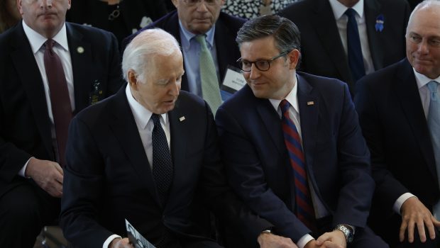 Joe Biden talks to Speaker of the House Mike Johnson (