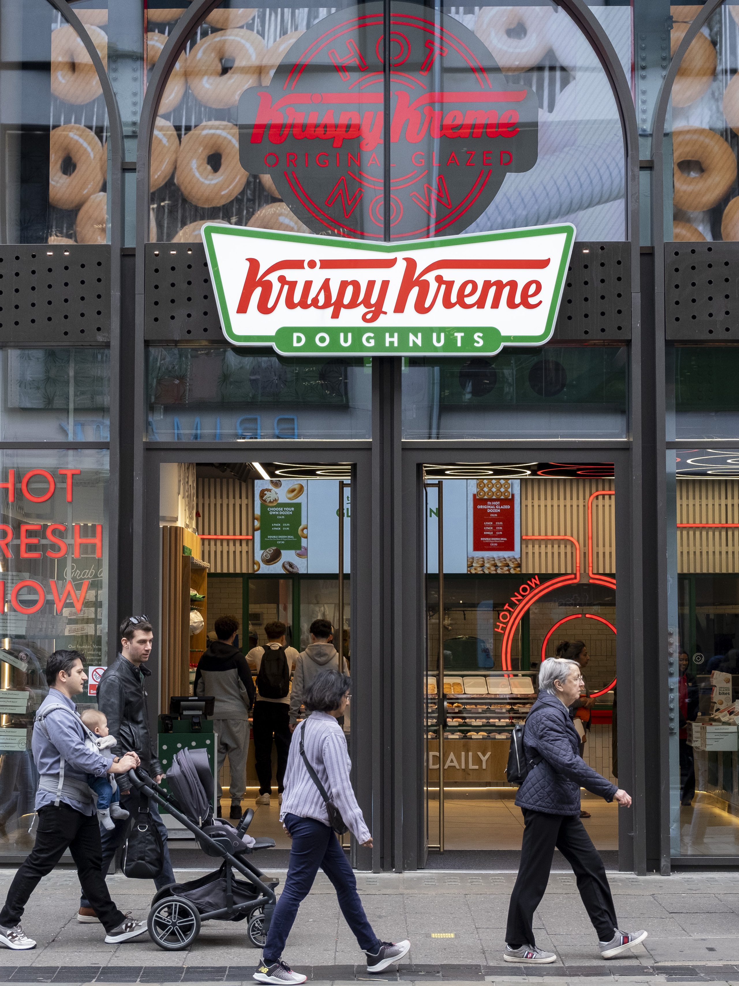 People outside Krispy Kreme, their new store on Oxford Street on 9th June 2024 in London, United Kingdom. Krispy Kreme, previously known as Krispy Kreme Doughnuts, Inc is an American multinational doughnut company and coffeehouse chain. (photo by Mike Kemp/In Pictures via Getty Images)