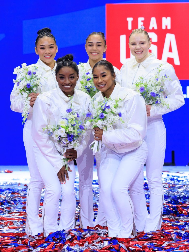 MINNEAPOLIS, UNITED STATES - JUNE 30: (Back to front, left to right) Suni Lee, Hezly Rivera, Jade Carey, Simone Biles, and Jordan Chiles celebrate after being named at the U.S. Olympic Team for women's gymnastics at Target Center in Minneapolis, United States on June 30, 2024. (Photo by Nikolas Liepins/Anadolu via Getty Images)