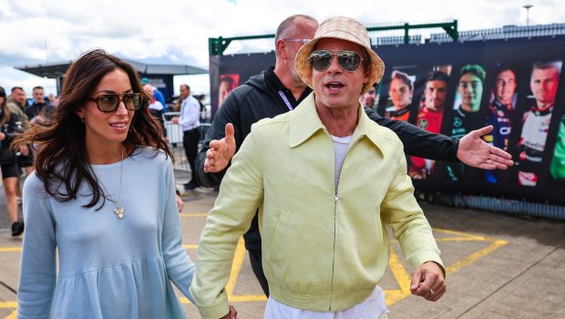 NORTHAMPTON, ENGLAND - JULY 7: Brad Pitt, star of upcoming 'F1' movie, arrives in the paddock with girlfriend Ines de Ramon during the F1 Grand Prix of Great Britain at Silverstone Circuit on July 7, 2024 in Northampton, United Kingdom. (Photo by Kym Illman/Getty Images)