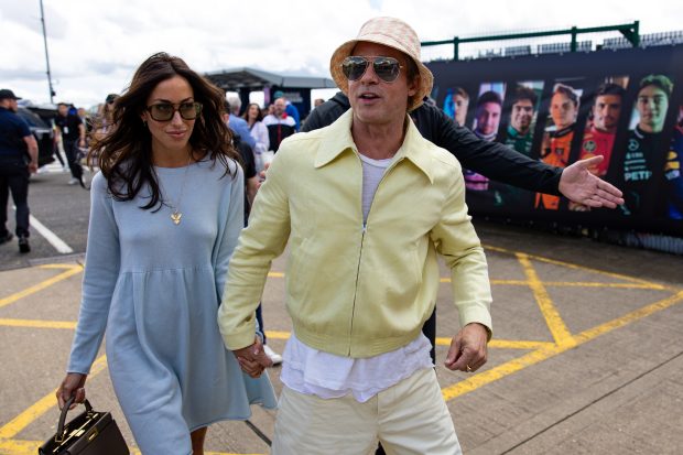  Actor Brad Pitt and girlfriend Ines De Ramon walk in the paddock during the F1 Grand Prix of Great Britain at Silverstone Circuit on July 7, 2024 in Northampton, United Kingdom. (Photo by Kym Illman/Getty Images)