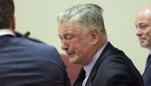 SANTA FE, NEW MEXICO - JULY 12: Alec Baldwin reacts as he sits between his attorneys Alex Spiro (L) and Luke Nikas (R) at the conclusion of his trial for involuntary manslaughter in First Judicial District Court on July 12, 2024 in Santa Fe, New Mexico. The trial for involuntary manslaughter was dismissed by a judge Friday after she ruled that key evidence over a fatal shooting on the set of "Rust" had been withheld from the defense. (Photo by Ramsay de Give-Pool/Getty Images)