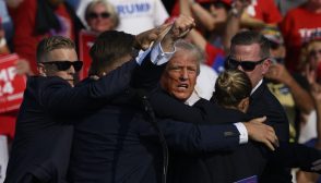 Donald Trump is whisked away by Secret Service after shots rang out at a campaign rally