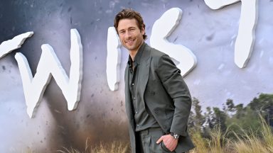 Glen Powell attends the Premiere of Universal Pictures' "Twisters"