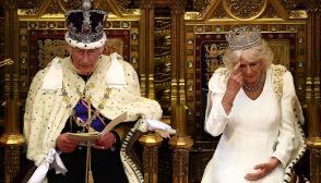 Britain's King Charles III, wearing the Imperial State Crown and the Robe of State, sits alongside Britain's Queen Camilla, wearing the George IV State Diadem, as he reads the King's Speech from the The Sovereign's Throne in the House of Lords chamber, during the State Opening of Parliament, at the Houses of Parliament, in London, on July 17, 2024. (Photo by HENRY NICHOLLS / POOL / AFP) (Photo by HENRY NICHOLLS/POOL/AFP via Getty Images)