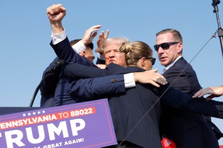 BUTLER, PENNSYLVANIA - JULY 13: Republican presidential candidate former President Donald Trump is rushed offstage during a rally on July 13, 2024 in Butler, Pennsylvania. (Photo by Anna Moneymaker/Getty Images)