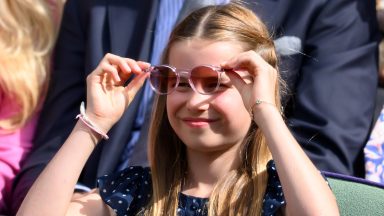 LONDON, ENGLAND - JULY 14: Princess Charlotte of Wales court-side of Centre Court during the men's final on day fourteen of the Wimbledon Tennis Championships at the All England Lawn Tennis and Croquet Club on July 14, 2024 in London, England. (Photo by Karwai Tang/WireImage)