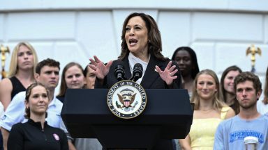 US Vice President Kamala Harris speaks during an event honoring National Collegiate Athletic Association (NCAA) championship teams from the 2023-2024 season, on the South Lawn of the White House in Washington, DC on July 22, 2024. Joe Biden on July 21, 2024 dropped out of the US presidential election and endorsed Vice President Kamala Harris as the Democratic Party's new nominee, in a stunning move that upends an already extraordinary 2024 race for the White House. Biden, 81, said he was acting in the "best interest of my party and the country" by bowing to weeks of pressure after a disastrous June debate against Donald Trump stoked worries about his age and mental fitness. (Photo by Brendan SMIALOWSKI / AFP) (Photo by BRENDAN SMIALOWSKI/AFP via Getty Images)