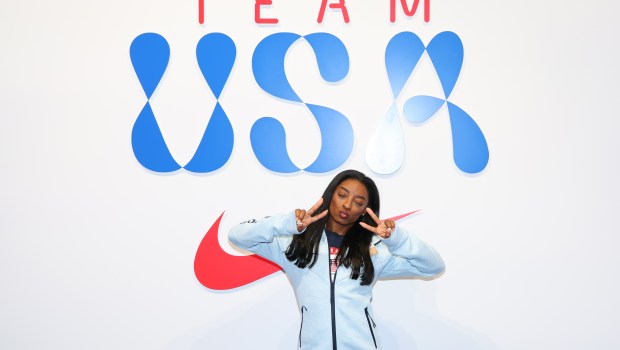 PARIS, FRANCE - JULY 22: Simone Biles tries on clothes at the Team USA Welcome Experience Ahead of Paris 2024 on July 22, 2024 in Paris, France.  (Photo by Joe Scarnici/Getty Images for USOPC)