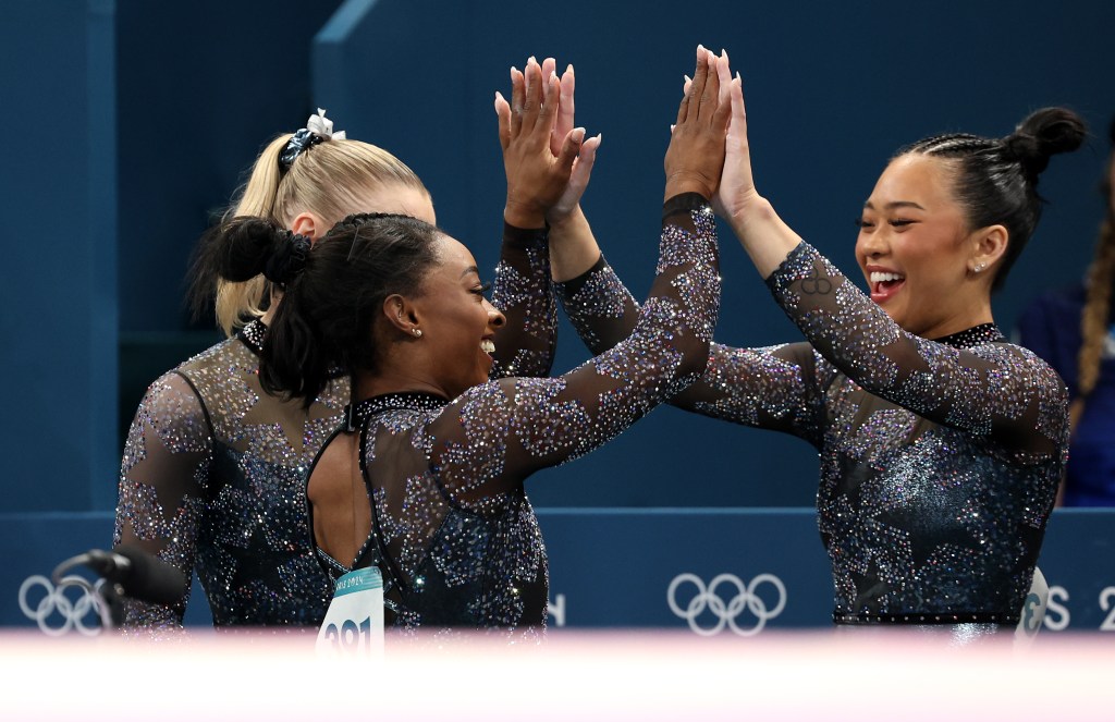  Simone Biles celebrates with teammate Sunisa Lee of Team United States during the Artistic Gymnastics Women's Qualification on day two of the Olympic Games Paris 2024 at Bercy Arena on July 28, 2024 in Paris, France. (Photo by Jamie Squire/Getty Images)