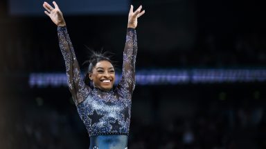 PARIS, FRANCE - JULY 28: Simone Biles from Team United States reacts after her exercise on the balance beam during day two of the Olympic Games Paris 2024 at the Bercy Arena on July 28, 2024 in Paris, France. (Photo by Tom Weller/VOIGT/GettyImages)