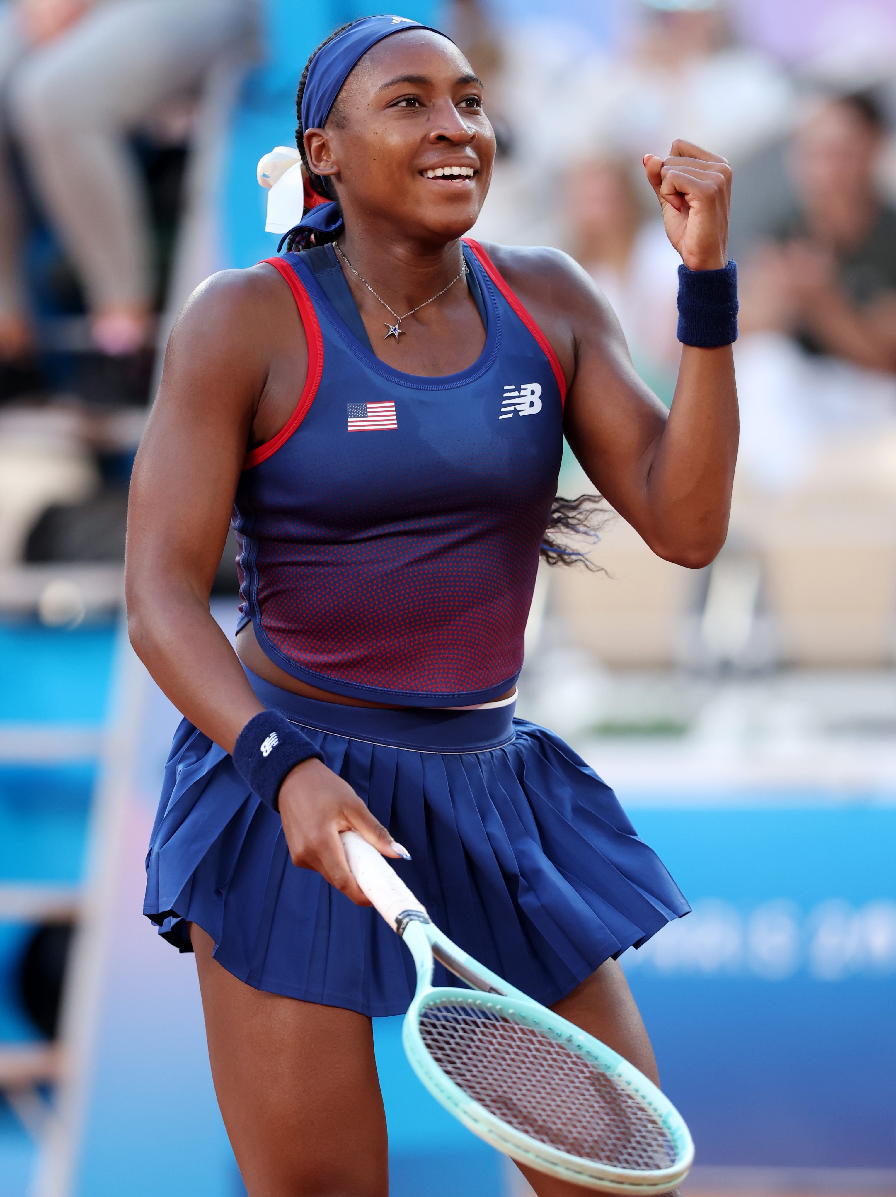 PARIS, FRANCE - JULY 28: Coco Gauff of Team United States celebrates winning match point against Ajla Tomljanovic of Team Australia during the Women’s Singles first round match on day two of the Olympic Games Paris 2024 at Roland Garros on July 28, 2024 in Paris, France. (Photo by Matthew Stockman/Getty Images)