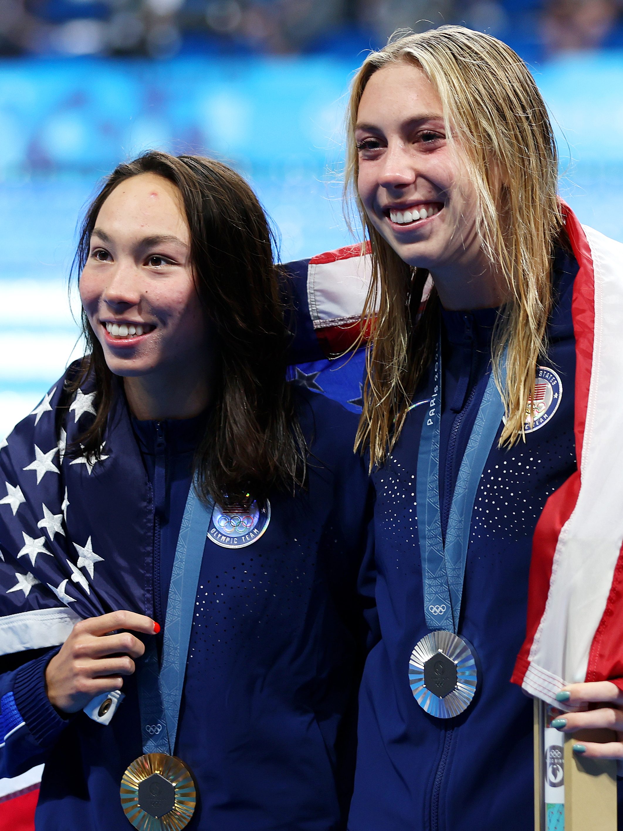 NANTERRE, FRANCE - JULY 28: Gold Medalist Torri Huske (L) and Silver Medalist Gretchen Walsh (R) of Team United States pose following the Swimming medal ceremony after the Women’s 100m Butterfly Final on day two of the Olympic Games Paris 2024 at Paris La Defense Arena on July 28, 2024 in Nanterre, France. (Photo by Sarah Stier/Getty Images)