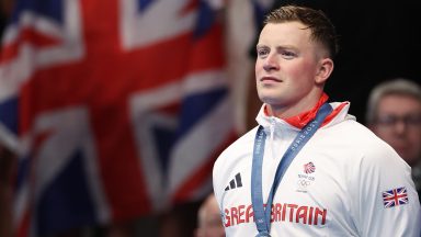 NANTERRE, FRANCE - JULY 28: Adam Peaty of Team Great Britain is seen on the podium with his silver medal from the Men's 100m Breaststroke final on day two of the Olympic Games Paris 2024 at Paris La Defense Arena on July 28, 2024 in Nanterre, France. (Photo by Ian MacNicol/Getty Images)