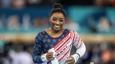 PARIS, FRANCE: JULY 30: Simone Biles of the United States reacts after performing her uneven bars routine during the Artistic Gymnastics Team Final for Women at the Bercy Arena during the Paris 2024 Summer Olympic Games on July 30th, 2024 in Paris, France. (Photo by Tim Clayton/Corbis via Getty Images)